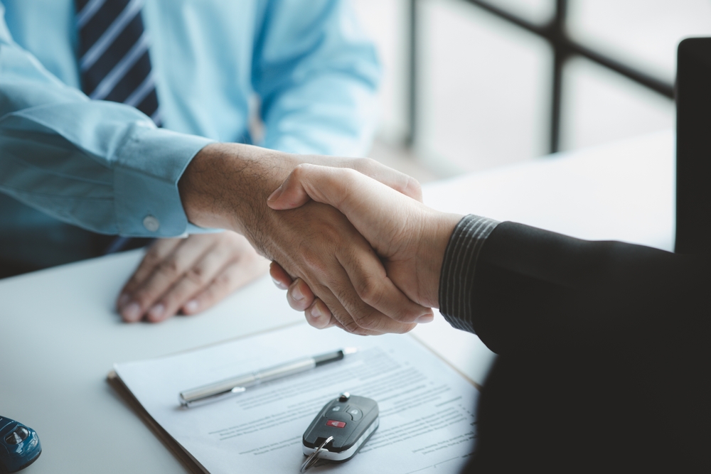 a,car,salesman,is,explaining,the,purchase,details,and,details a,car,salesman,is,explaining,the,purchase,details,and,details